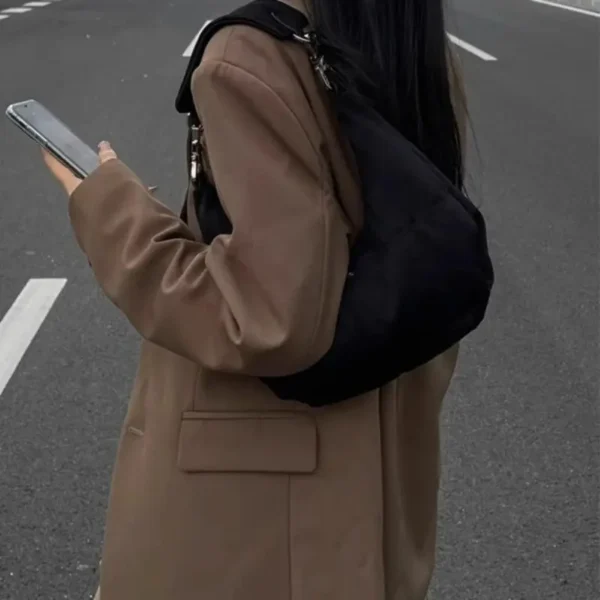 black nylon crescent handbag